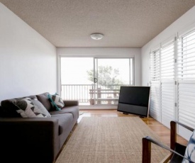 Re-Imagined Urban Flat with Skyline View Balcony