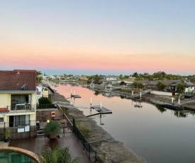 Canal-View Unit with Balcony and Pool near Beach