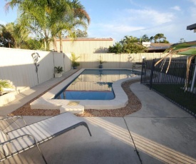 62 Tingira Close - Modern lowset home with swimming pool, outdoor area, ample parking. Pet friendly