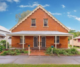 Eliza 1875 Red Brick Duplex Townhouse