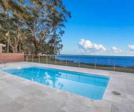 Seaside Sanctuary - Waterfront Luxury Home with Heated Pool